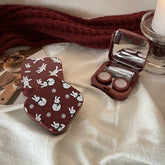 Estuche para lentes de contacto color vino tinto con diseño de nicho INS